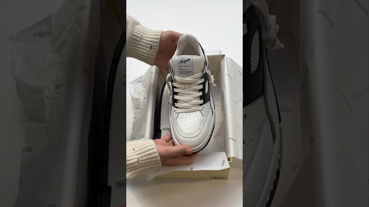 Axel Arigato unboxing. An ode to the ‘90s basketball sneaker. Shop the latest Area Lo.